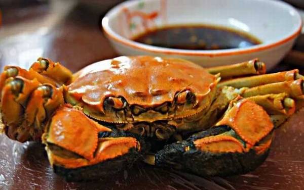 螃蟹和牛奶能一起吃吗?